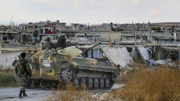 A Syrian army armoured vehicle  near the village of Morek in Syria on Wednesday. 
