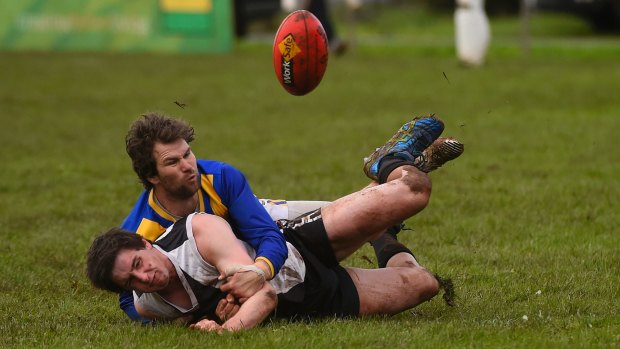 Joel Quarrell being tackled while playing country football.