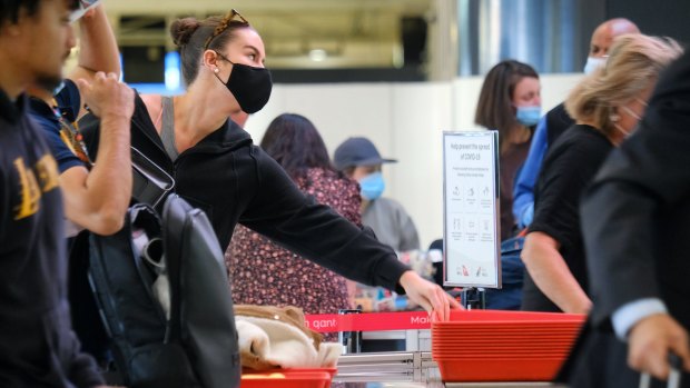 Travellers pass through security at Melbourne Airport's Terminal 1 during the Easter holidays. Thus far, only the airport's Terminal 4 has the new scanners installed.