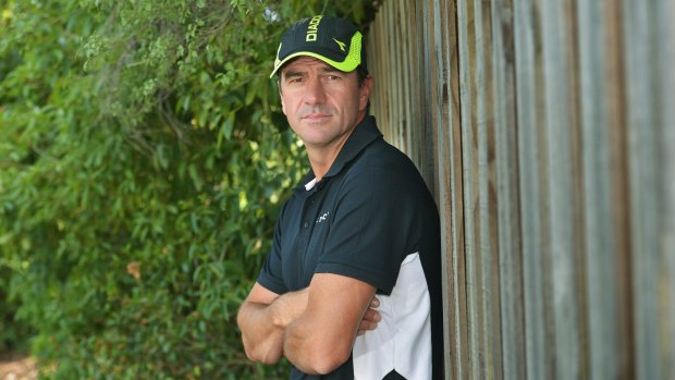 Up against the fence: Simon Helmot reflects on being axed as Renegades coach. 