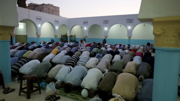 Men pray during the holy month of Ramadan at a mosque in Tunis.