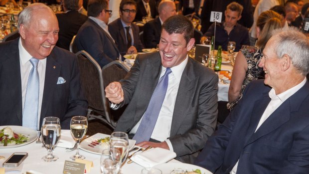 Jones shares a joke with fellow owner James Packer at a function.