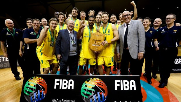 Off to Rio: Patty Mills and Matthew Dellavedova of the Boomers hold the Al Ramsay Shield after winning the game two match between the New Zealand Tall Blacks and Australian Boomers at TSB Bank Arena in Wellington.