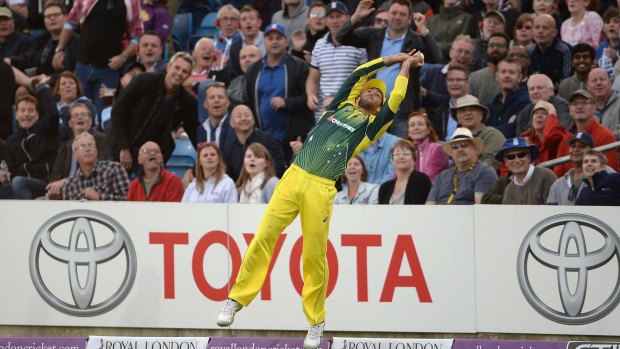 One of the best grabs ever ... Glenn Maxwell catches out Liam Plunkett of England before throwing the ball into the air, stepping over the boundary line and catching him again on the field.
