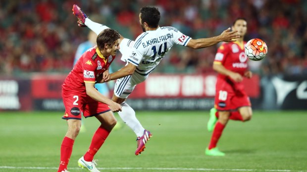 Melbourne Victory's Fahid Ben Khalfallah takes a tumble during Friday's match.
