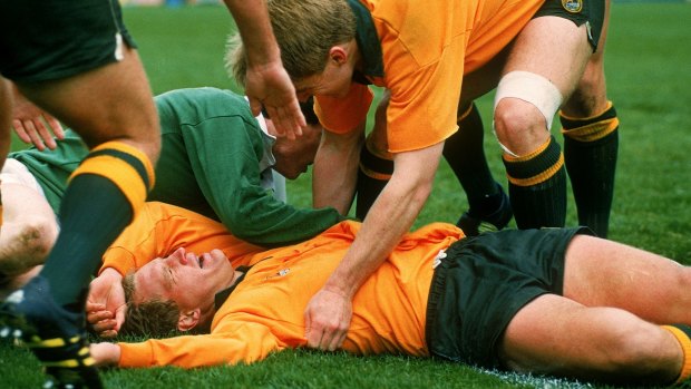 Flat out memorable moment: Michael Lynagh after he scores the match-winning try during the Rugby World Cup clash with between Australia and Ireland in 1991 at Dublin. 