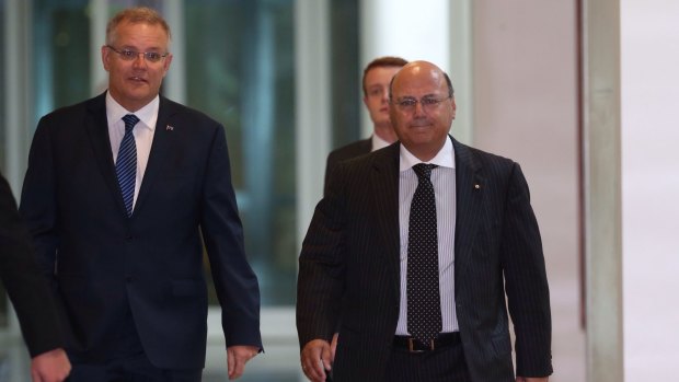 Scott Morrison walks to the party room leadership spill in February alongside Malcolm Turnbull supporter Arthur Sinodinos.
