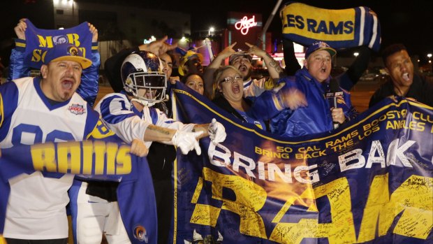 Winners ... NFL fans cheer for the return of the Rams to Los Angeles on the site of the old Hollywood Park horse-racing track in Inglewood, California.