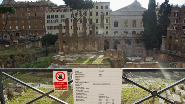 A sign forbids access to the area of the ancient Campus Martius in downtown Rome, where Julius Caesar is believed to have been assassinated in 44 BC.The monument is one of 100 looking for sponsors.