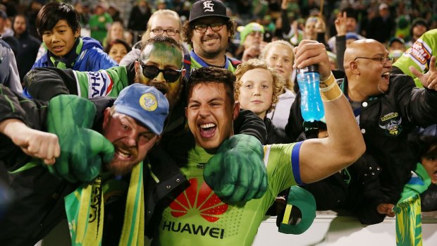 Joseph Tapine of the Raiders celebrates with fans after victory in the second NRL Semi Final match between the Canberra Raiders and the Penrith Panthers at GIO Stadium on September 17 in Canberra.