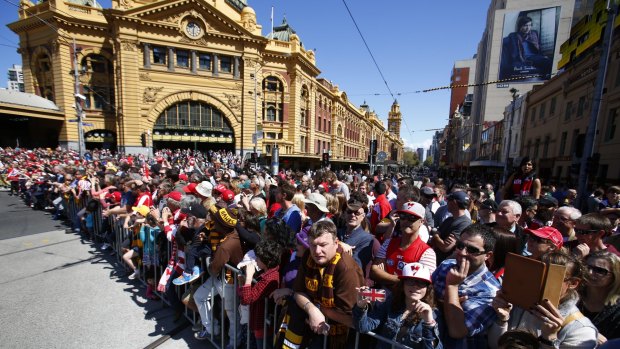 A big crowd turned out in the centre of Melbourne for the 2014 AFL grand final parade.