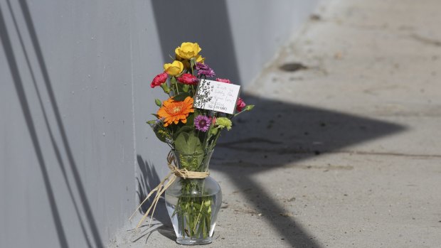 A makeshift memorial near the police perimeter of the mass shooting in San Bernardino.