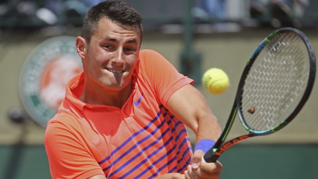 Bernard Tomic in action against Italy's Luca Vanni on Monday.