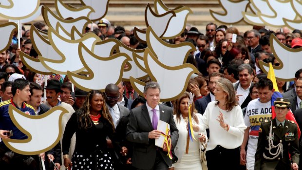 Colombian President Juan Manuel Santos delivers the original peace deal to Congress.