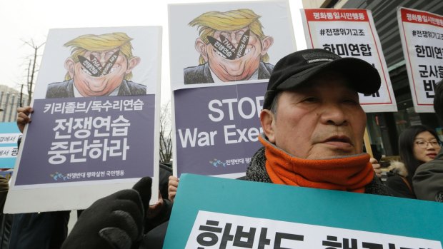 A South Korean protester attends a rally to oppose the joint military exercises, dubbed Key Resolve and Foal Eagle, last week.