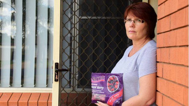 Leisa Ross with the packet of Nanna's frozen mixed berries that she alleged gave her hepatitis A.