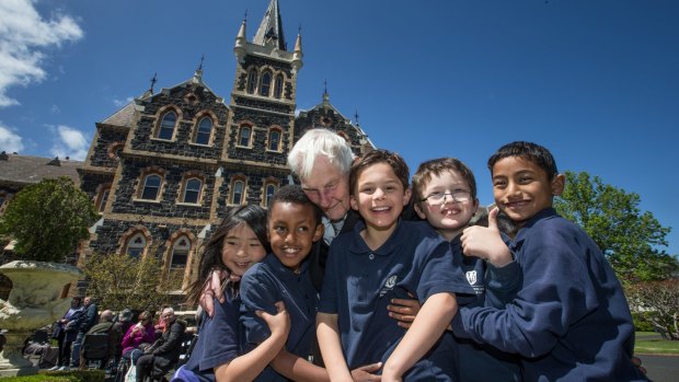 Bruce Missen, 84, with current Victorian College for the Deaf students, celebrates 150 years since the opening of the neo-gothic St Kilda Road building.