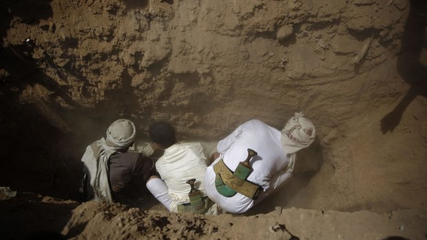 Shiite Houthis rebels bury one of their comrades, killed in a suicide bomb attack by Sunni Islamist militants.