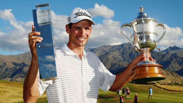 Jordan Zunic holds up the New Zealand Open trophy after his win on Sunday.