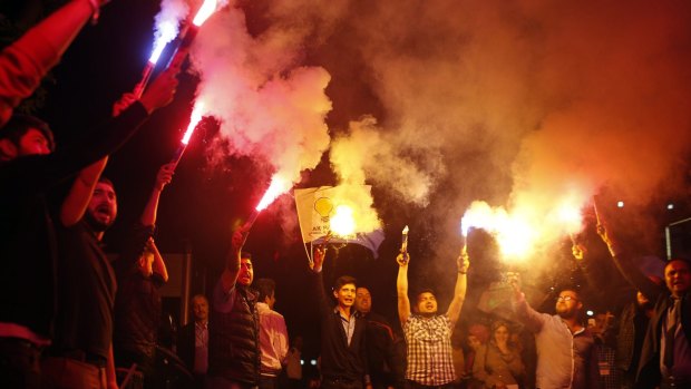 Celebrations in Istanbul as Turkey's ruling Justice and Development party retained power. 