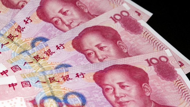 The People's Bank of China set the reference rate 0.9 per cent weaker at 6.6375 a US dollar.