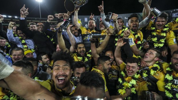 Winning ugly is beautiful: The Hurricanes celebrate after winning the 2016 Super Rugby final.