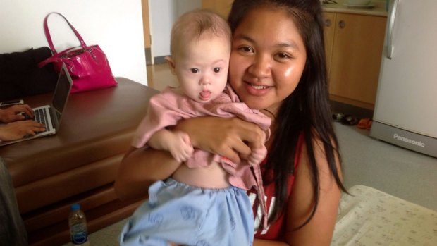 Pattaramon Chanbua poses with baby Gammy at the Samitivej Hospital, Bangkok in August 2014.