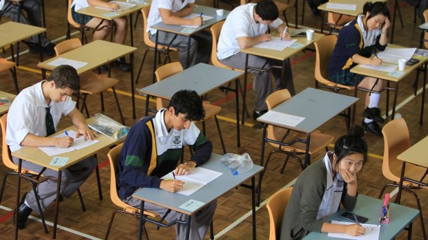 Students from Killara High School sit for their first HSC exam this week.