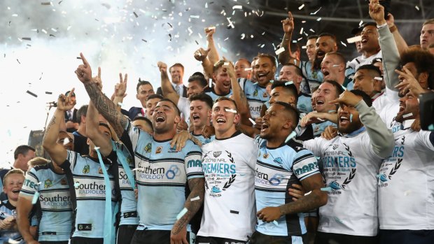The Cronulla Sharks celebrate their victory over Melbourne Storm.