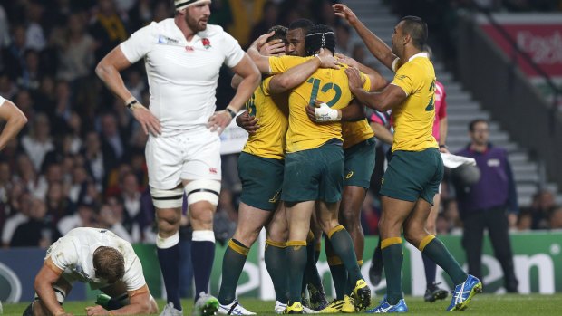 Australian players celebrate as England are left to ponder what went wrong. 