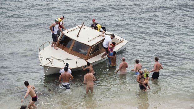 It quickly became apparent that those on board needed help - and luckily, some keen swimmers leapt into action. 
