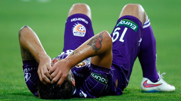 Perth Glory's Joshua Risdon takes a breather during his side's loss to Adelaide.