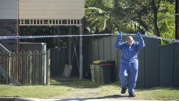 Forensic police at the house where Tina Kontozis was allegedly bashed to death.