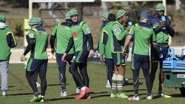 Heating up: Raiders players trained in beanies and compression clothing on Wednesday to get used to the Townsville climate.