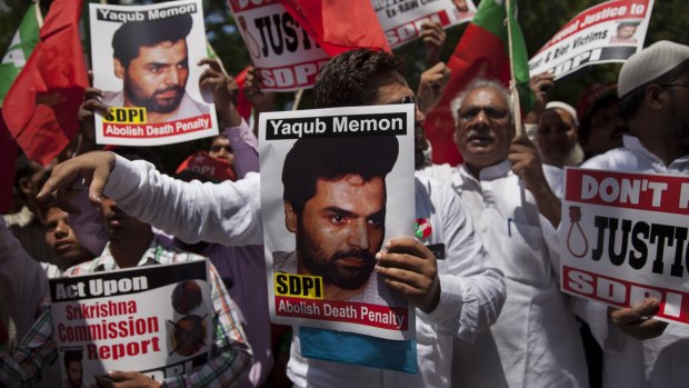 Social Democratic Party of India (SDPI) activists carry placards with photographs of Yakub Memon during a protest demanding abolition of death penalty in New Delhi on Monday.