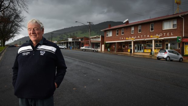 Tallangatta historian Ray Crispin photographed in front of the "new" Tallangatta Hotel.
