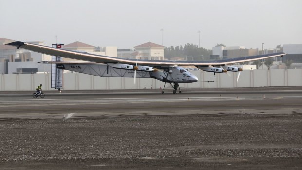 The Solar Impulse 2 takes off at Al Bateen airport in Abu Dhabi at the start of an attempt to fly around the world in the solar-powered plane.