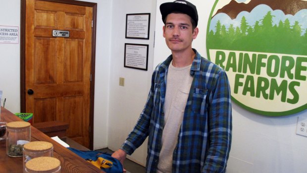 James Barrett, a co-owner of Rainforest Farms, in his retail marijuana shop in Juneau, Alaska. 