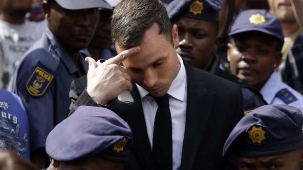 Found guilty of culpable homicide: Oscar Pistorius leaves the high court in Pretoria last year.