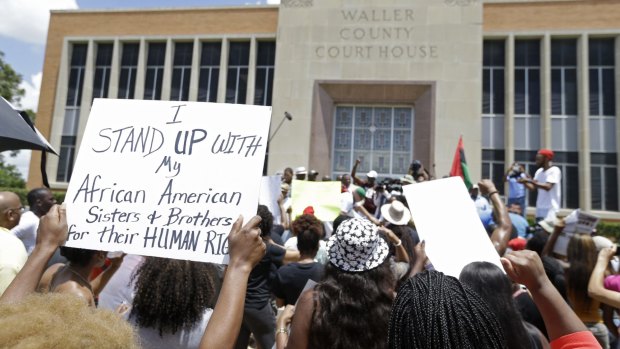 Protesters rally outside the Waller County Courthouse on Friday.