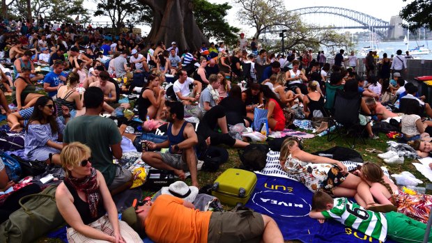Crowds build as they wait for New Year's Eve fireworks on Sydney Harbour.