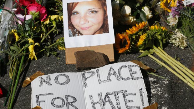 A makeshift memorial for Heather Heyer, who died when a car rammed into a group of people who were protesting the presence of white supremacists who had gathered in the city for a rally. 