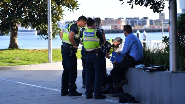 Police at the scene in Docklands where a dead body discovered. 