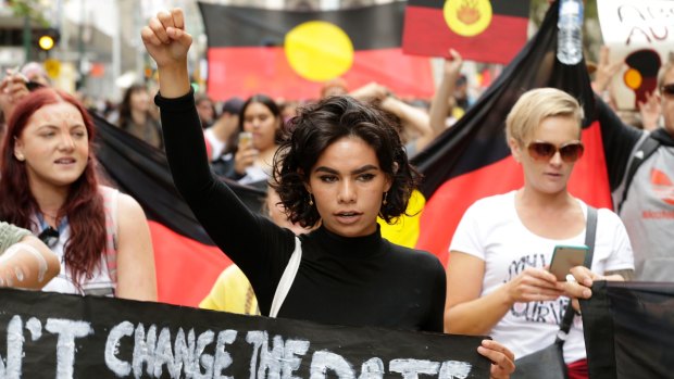 A woman taking part in the Invasion Day Melbourne rally.