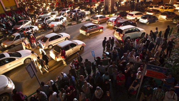 Iranians celebrate in the street following the signing of the deal that is expected to improve conditions in the country.