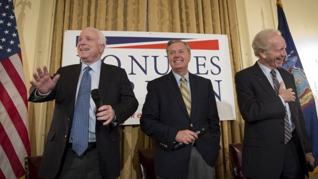 Left to right: Senator John McCain, Republican presidential candidate Senator Lindsey Graham and former Senator Joe Lieberman attend a campaign event on Monday.
