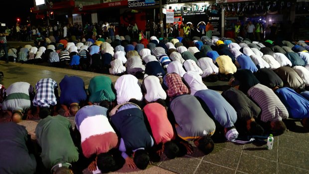 Prayers ... Sydney Muslims gather at a rally to show their support for the Prophet Muhammad in the suburb of Lakemba.