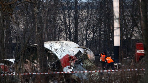Disintegrated in the air ... Authorities inspect the debris on the site of the plane crash that killed Polish President Lech Kaczynski, his wife and other prominent leaders near Smolensk, western Russia on April 10, 2010.