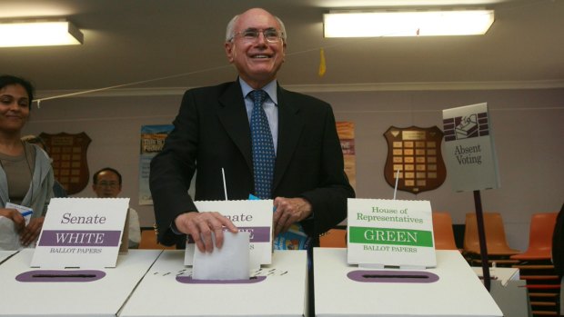 John Howard continued as prime minister in a caretaker capacity after losing his seat.