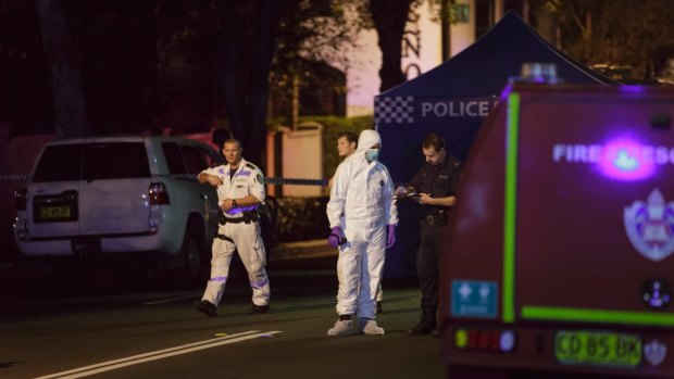 Police at the scene of the terrorism raid in Surry Hills